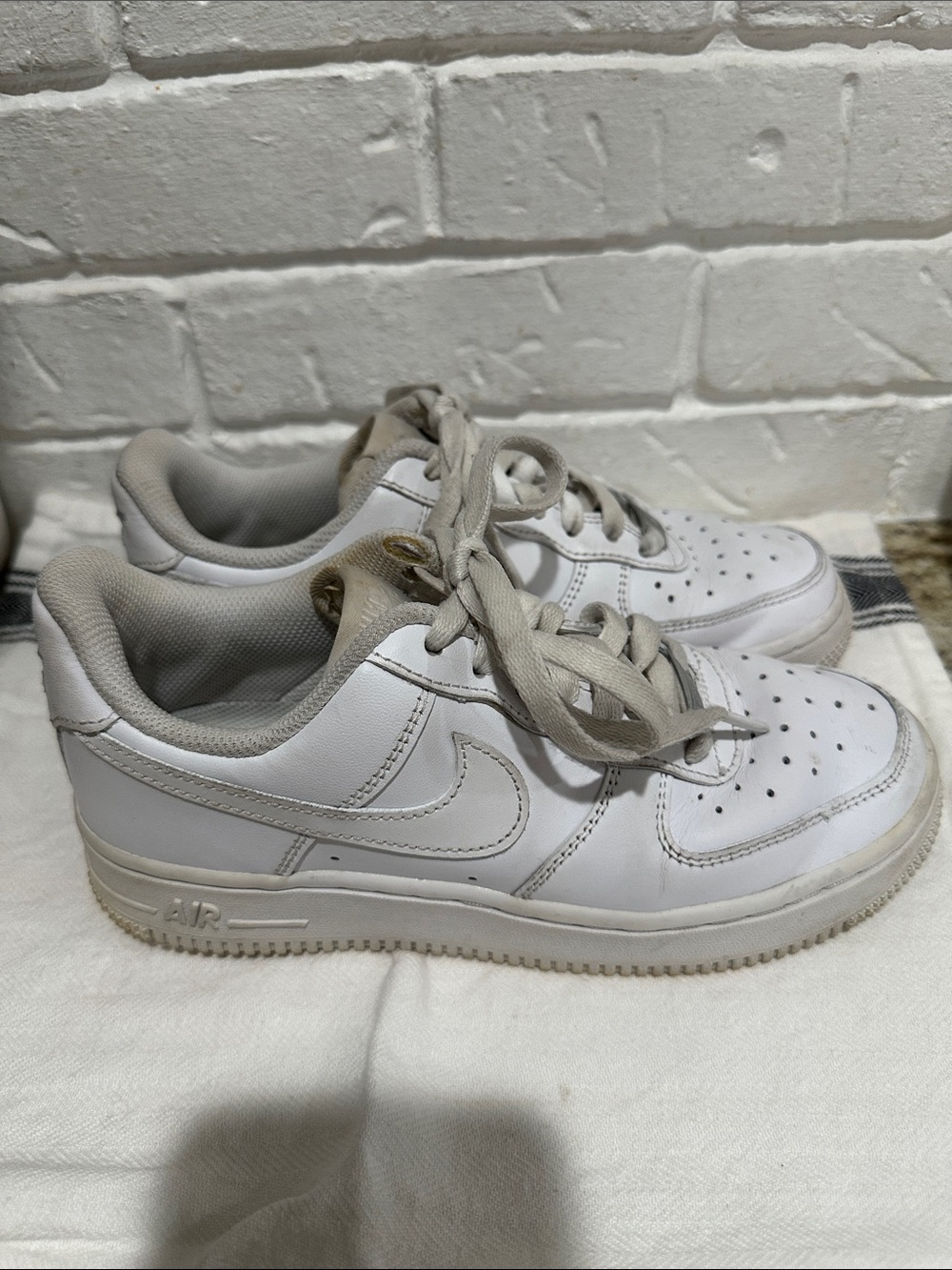 Nike size 6 women’s White Low-Top Sneakers with Light Gray Accents